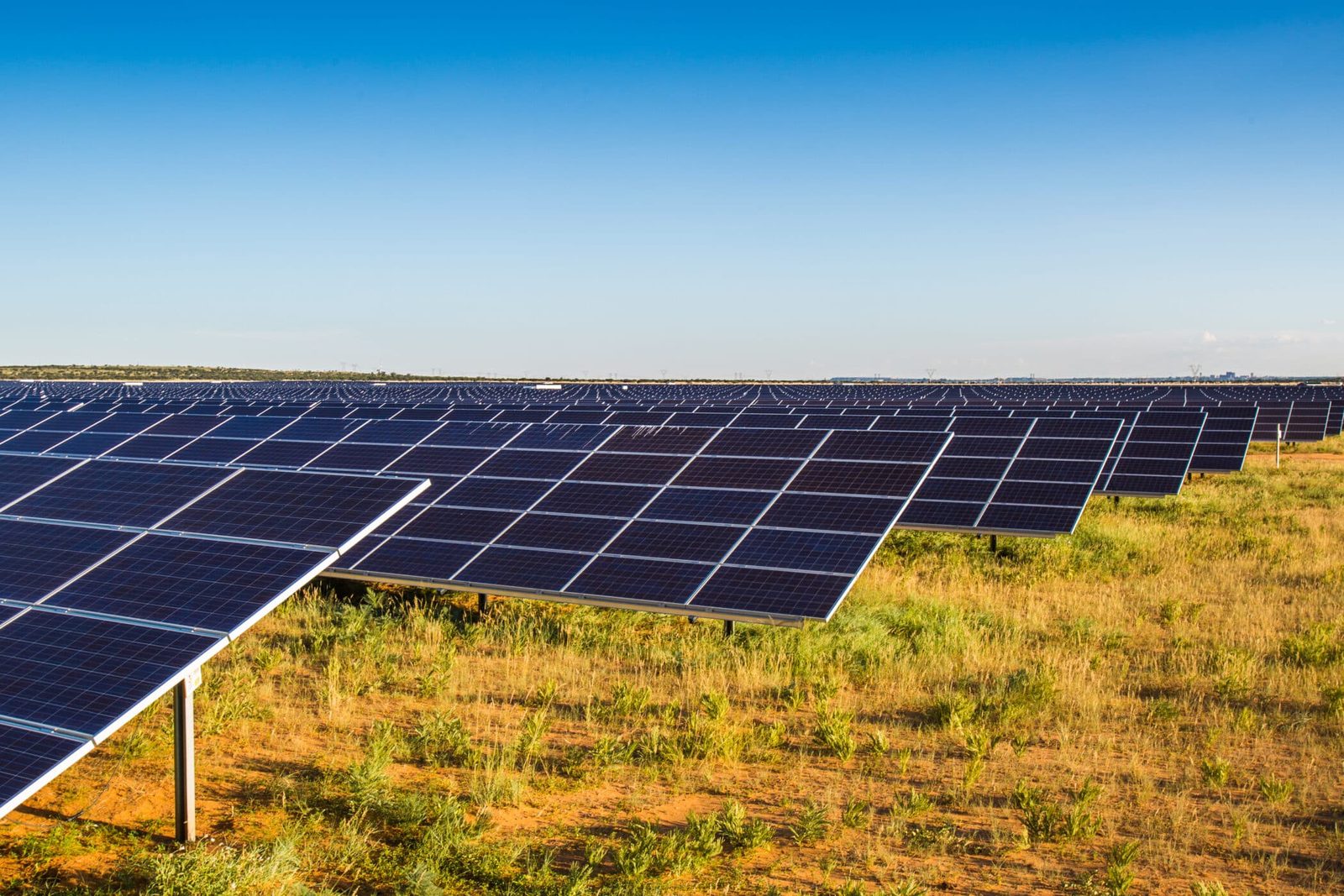 Utility-scale solar photovoltaic array in an open field